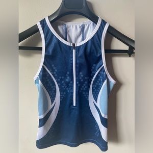 2/$40-   Sugoi women’s cycling top size SM